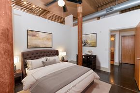 Porterdale apartment for rent - a bedroom with a bed in a loft