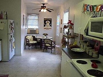 Nashville apartment for rent - a kitchen with a stove and a dining room