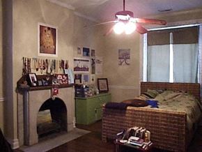 Nashville apartment for rent - a living room with a fireplace and a bed