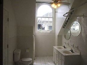 Nashville apartment for rent - a bathroom with a toilet and a sink and a window