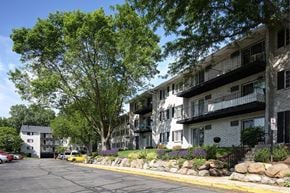 Madison townhouse for rent - a row of apartment buildings on the side of a street