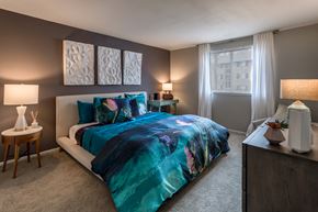 Columbia apartment for rent - Bedroom with teal bedding and contemporary decor at The Brook At Columbia Apartments, Maryland