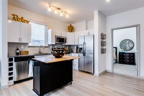 Richmond apartment for rent - a kitchen with stainless steel appliances and a counter top