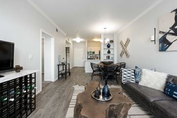 Phoenix apartment for rent - a living room with a couch and a table and a television