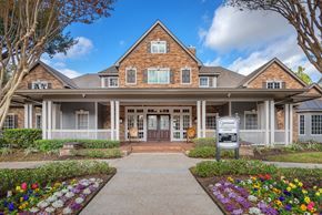 Spring apartment for rent - Lodge at Cypresswood Apartments - Leasing office entrance