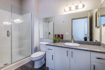 Centre pointe apartments deep soaking tubs and glass shower enclosures*