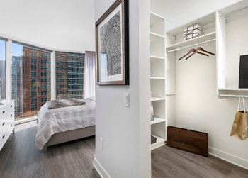 Walk-in closets with custom built-in shelving*