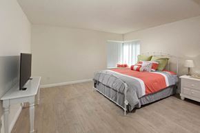 Moorpark apartment for rent - a bedroom with a bed and a television