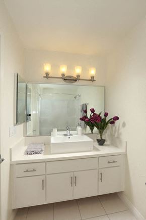 Moorpark apartment for rent - a white bathroom with a sink and a mirror
