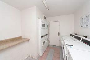 Phoenix apartment for rent - an empty kitchen with white appliances and a counter