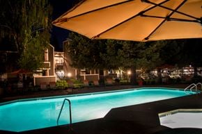 Sacramento apartment for rent - Apartments for Rent in Sacramento, CA-Waterford-Cove-Pool with Lounge Seating and Umbrellas