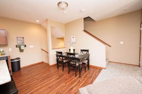 West Des Moines townhouse for rent - a dining room with a table and chairs