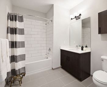 Grey tile bathroom