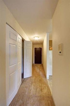 Round Lake apartment for rent - a hallway with white doors and a door to a bedroom