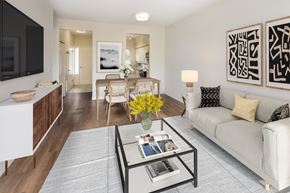 Vancouver apartment for rent - a living room with a couch and a glass coffee table