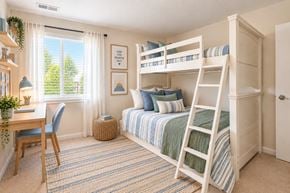 Dundalk apartment for rent - A cozy bedroom with a bunk bed and a desk.