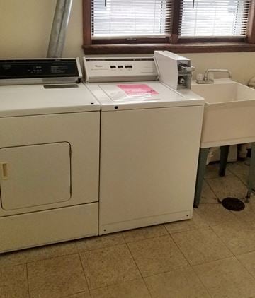 Mankato apartment for rent - a washer and dryer in a kitchen next to a sink
