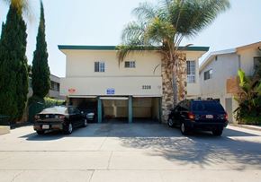Los Angeles apartment for rent - two cars parked in front of a building