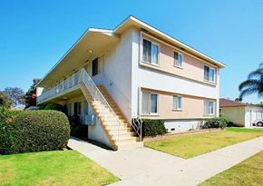 Culver City apartment for rent - A two-story house with a staircase leading to the second floor.