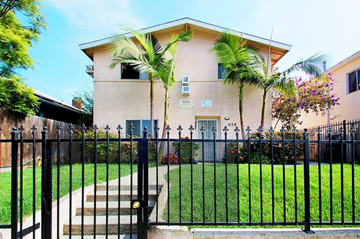 Los Angeles apartment for rent - A house with a black fence and a gate is shown.