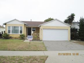 Los Angeles apartment for rent - A house with a sign that says "For Sale" in front of it.