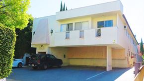 Los Angeles apartment for rent - an apartment building with a car parked in front of it