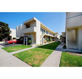 Los Angeles apartment for rent - a building with a red car parked in front of it