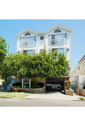 Los Angeles apartment for rent - a white house with a tree in front of it