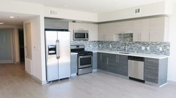 Los Angeles apartment for rent - a kitchen with a stainless steel refrigerator and stove