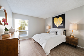Sherman Oaks apartment for rent - a bedroom with a bed and a dresser and a window