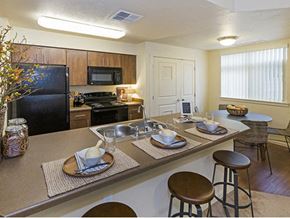Parker apartment for rent - Full kitchen with dining area view Parker CO Apartment Rentals at Copper Steepe 