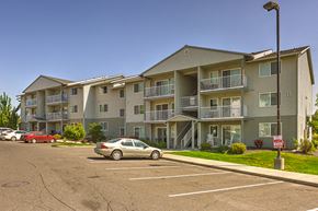 Spokane apartment for rent - Building Exterior and Parking Lot at FOREST CREEK APARTMENTS, Spokane, WA 99208