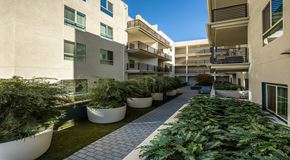 Los Angeles apartment for rent - Sidewalk through the community  l The Meridian Apartments in Los Angeles, CA