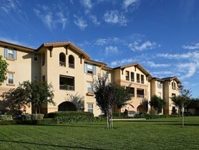 Pomona apartment for rent - Exterior Building and Grass l Portofino Villas Apartments  in Pomona CA 