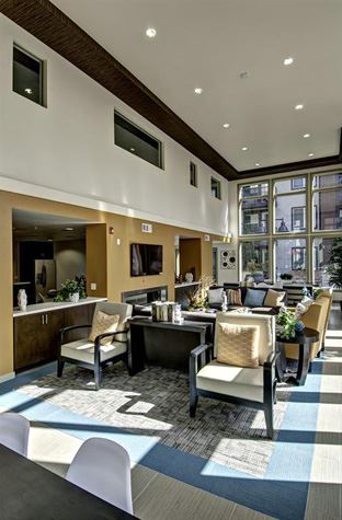 San Jose apartment for rent - A conference room with a long table and chairs.