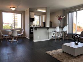 San Mateo apartment for rent - living and kitchen l Ryan Tower Apartments in San Mateo CA 