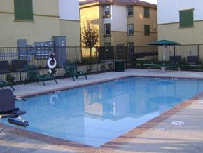 Bakersfield apartment for rent - Pool with seating   l Santa Fe Apartments in Bakersfield CA