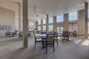 Marysville apartment for rent - Clubhouse chairs and tables at VINTAGE AT LAKEWOOD SENIORS Apartments, Marysville, WA