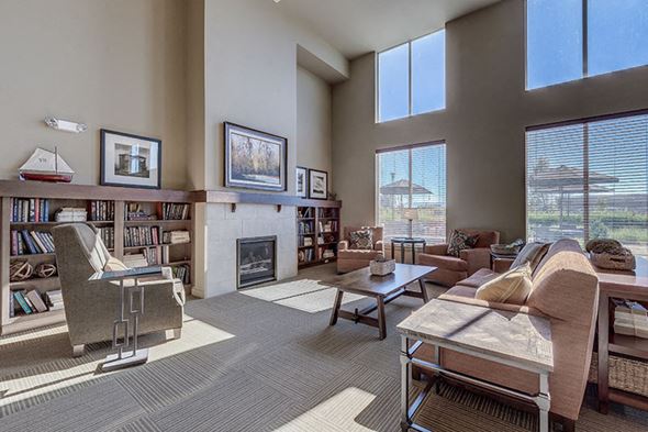 Marysville apartment for rent - Sitting area with Fireplace at VINTAGE AT LAKEWOOD SENIORS Apartments, Marysville