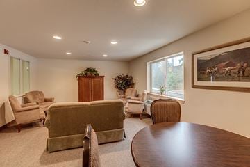 Silverdale apartment for rent - a living room with a table and chairs