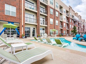 Relaxing pool area with sundeck