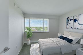 Denver apartment for rent - a bedroom with a white bed and a large window