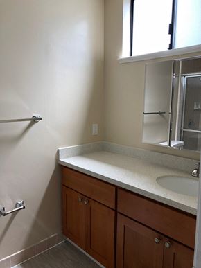 San Francisco apartment for rent - a bathroom with a sink and a mirror