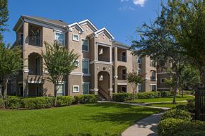 Stafford apartment for rent - A large, well-maintained apartment complex with multiple buildings and green lawns.