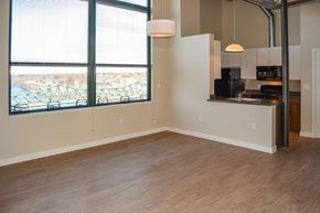Lowell apartment for rent - A kitchen area with a window overlooking a bridge.