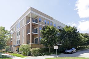 Rochester apartment for rent - an apartment building with a car parked in front of it