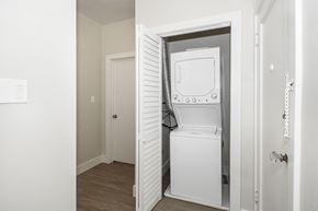 San Francisco apartment for rent - A white washing machine is in a small doorway.