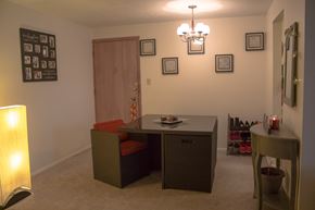 Middleburg Heights apartment for rent - a dining room with a table and a chair and a side table