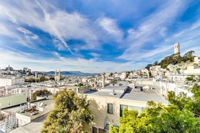 San Francisco apartment for rent - A cityscape with a prominent tower in the distance.