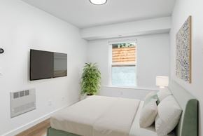 San Francisco apartment for rent - a bedroom with a bed and a tv